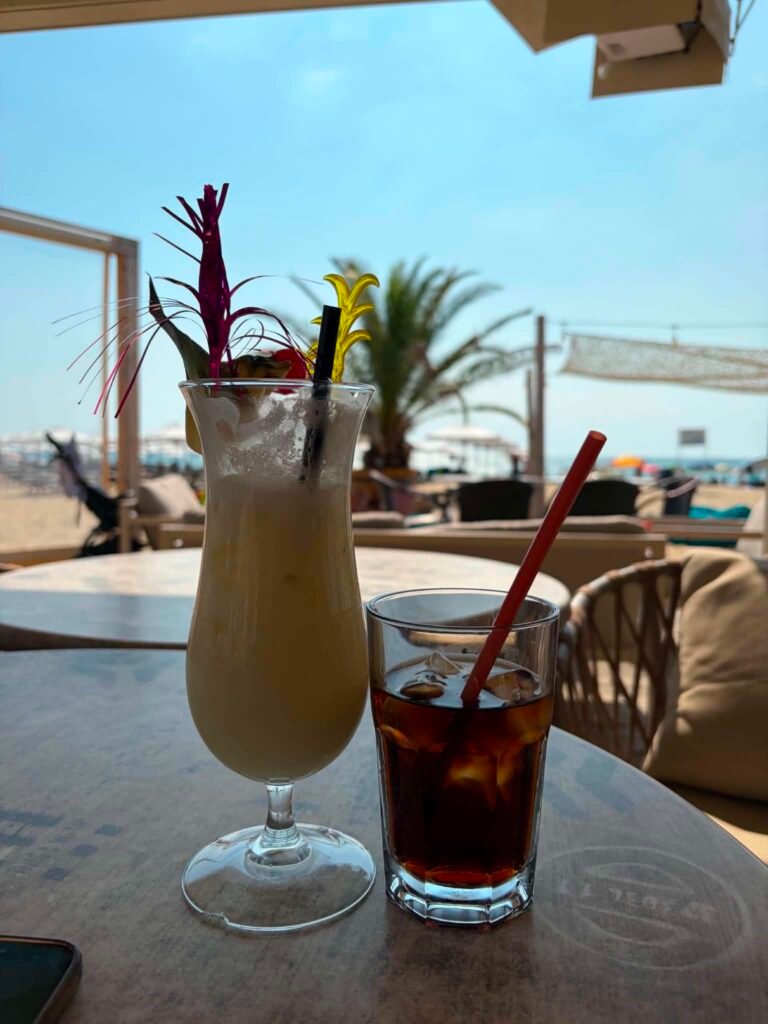 Two refreshing drinks on a table at a local bar while the kids are at the hotel kids club