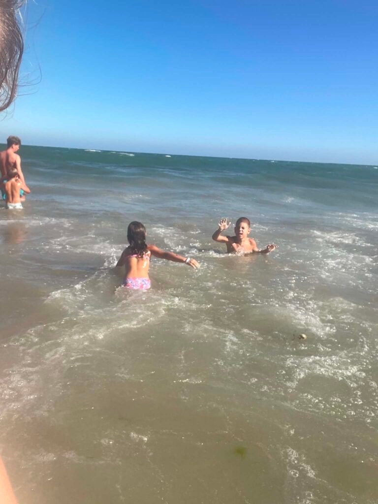 Our two children playing in the sea at Sunny Beach, Bulgaria