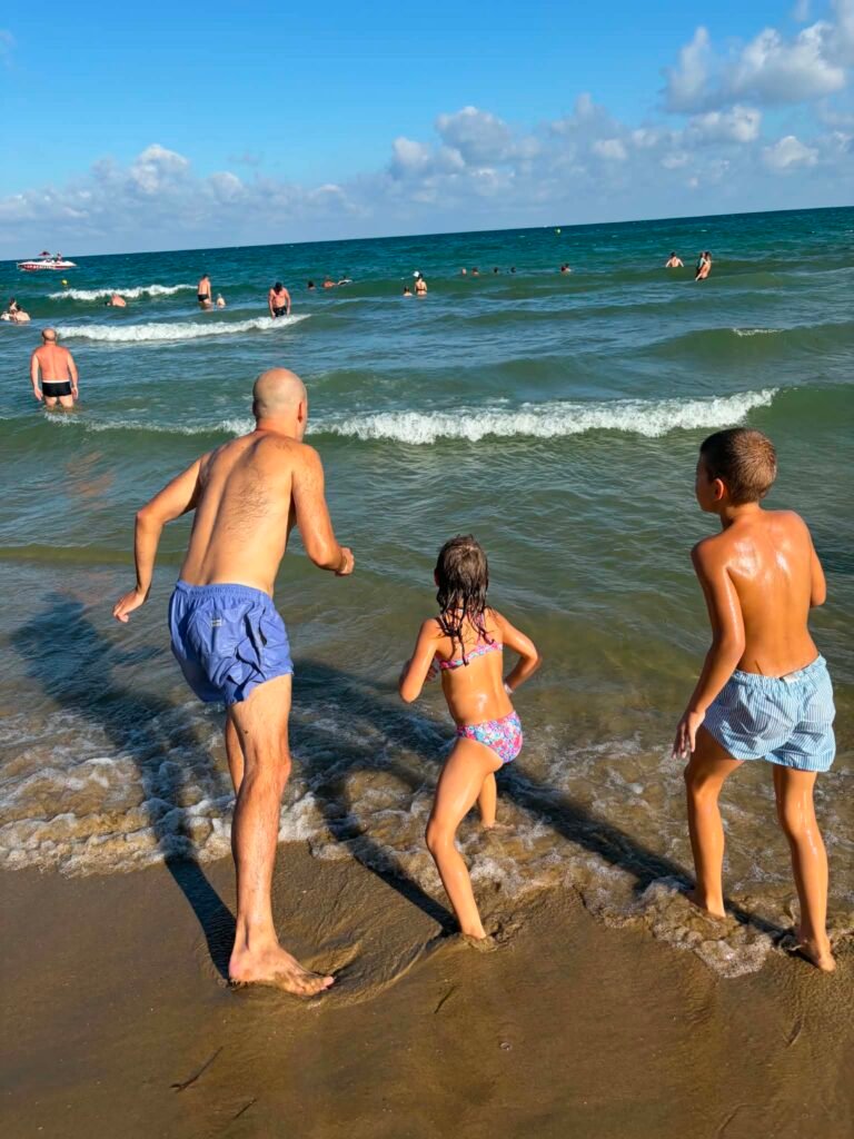 Playing in the waves at DIT Evrika`s Beach, Sunny Beach
