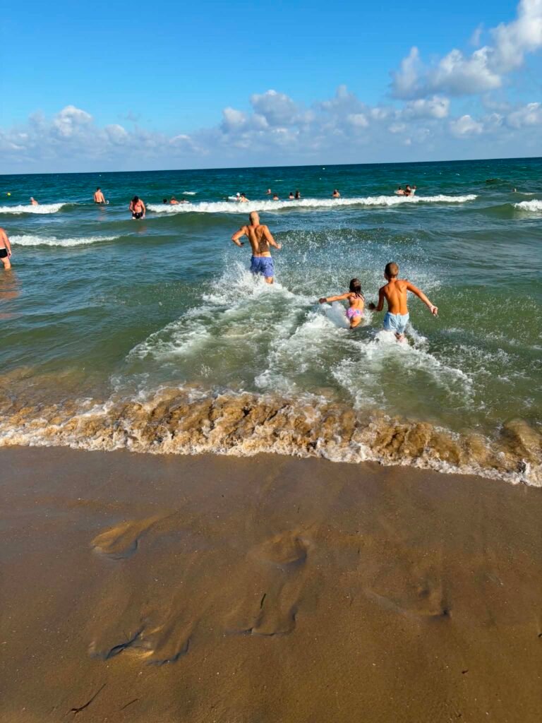 Playing in the sea at DIT Evrika Hotel`s beach