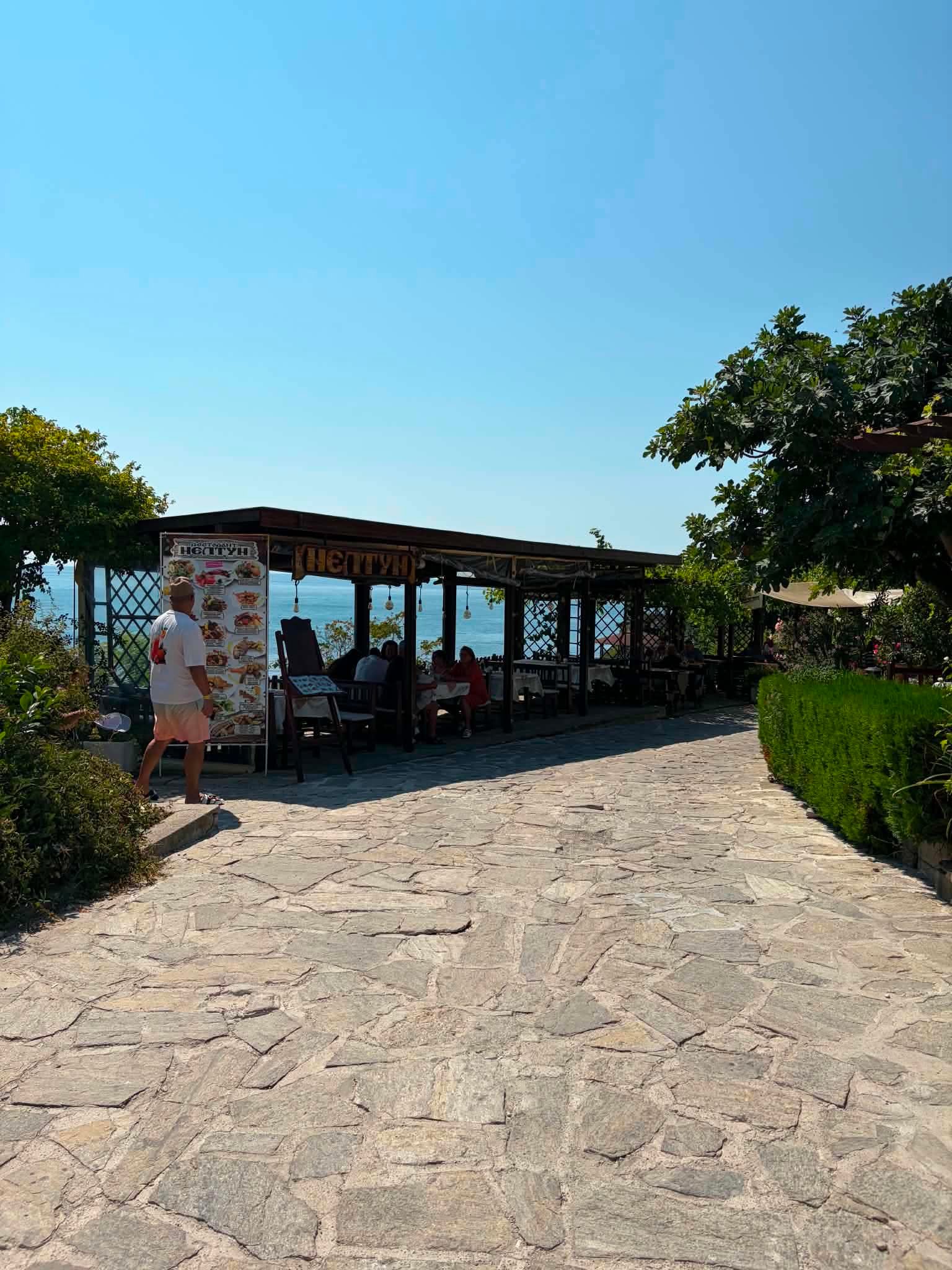 A restaurant with a view of the sea and Sunny Beach